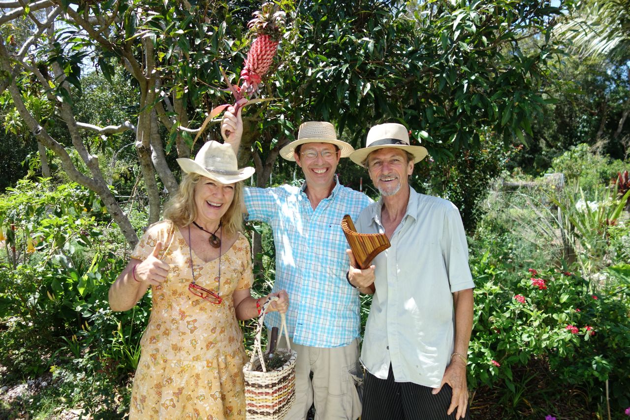 Jude Fanton, Jerry with pineapple he grew and Michel with panpipes during the filming of this segment
